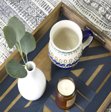 Mug, plant and candle